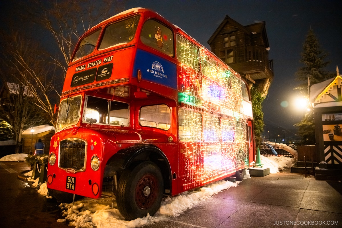 London bus covered in lights at Shiroi Koibito Park