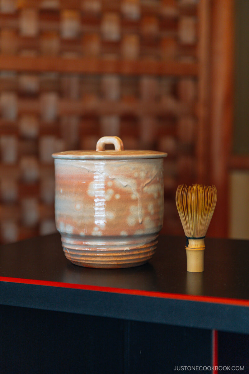 Pot and bamboo whisk used for matcha tea ceremony