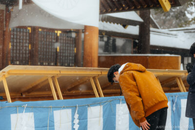 Bowing at a shrine
