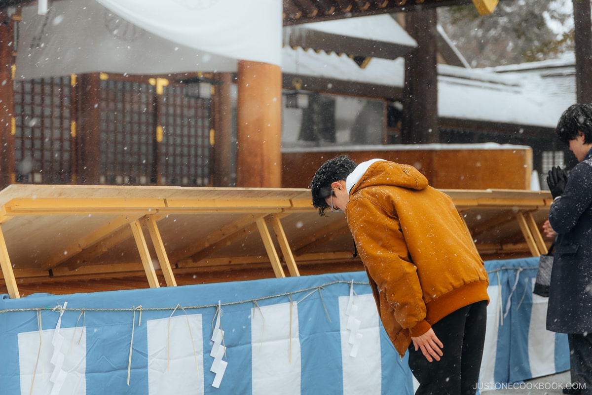 Bowing at a shrine