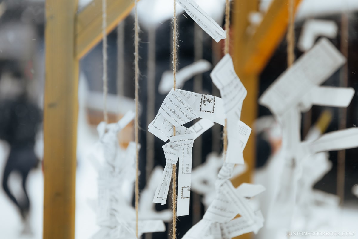 Omikuji tied on a rack