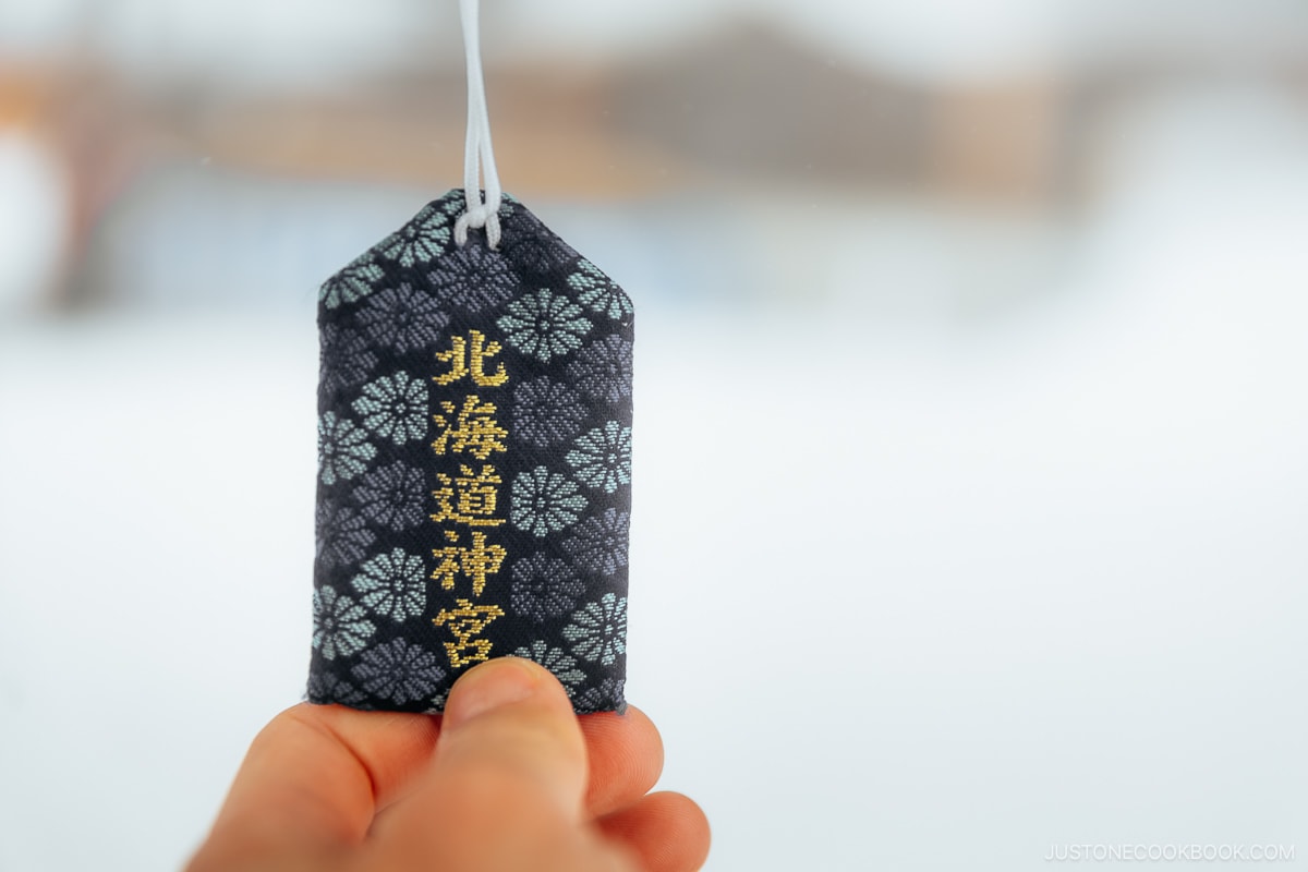 Blue Omamori with Hokkaido Jingu written in kanji