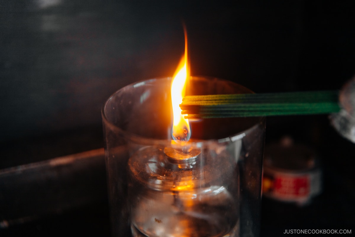 Lighting the incense