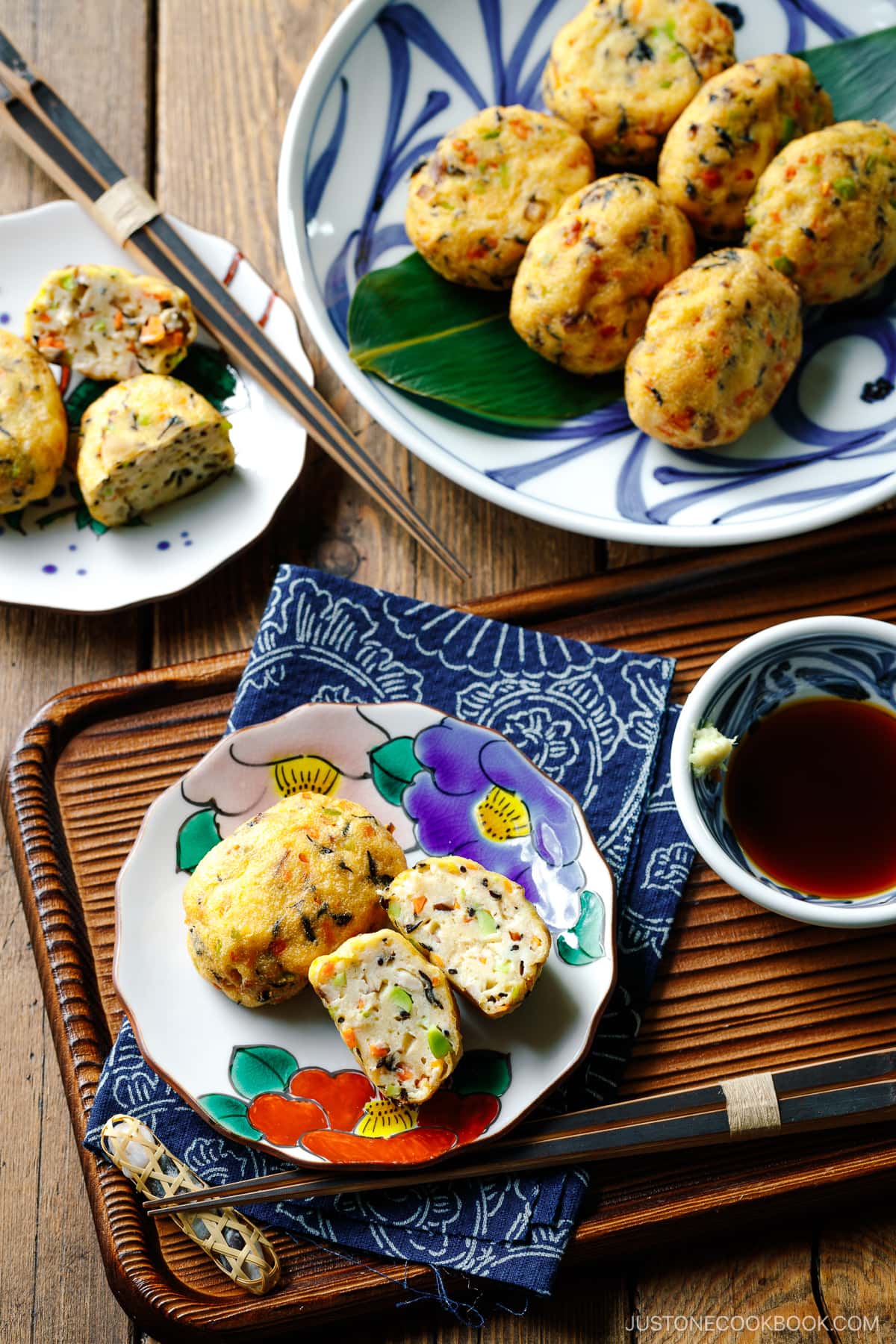 Japanese plates containing Ganmodoki (Japanese fried tofu patties).