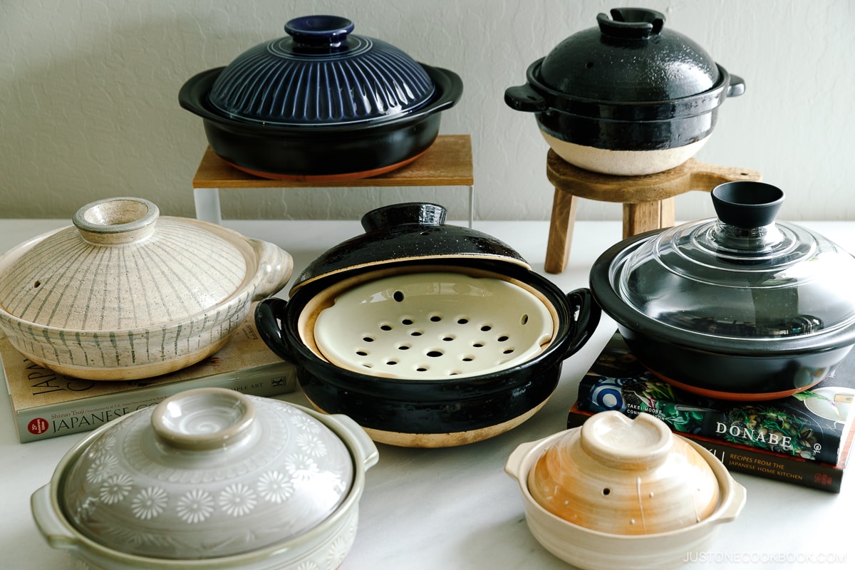 Varioius types of donabe, Japanese clay pots on the table.