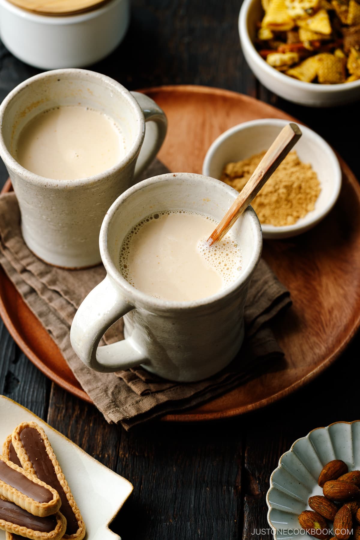 Handmade ceramic mug cups containing hot kinako milk.