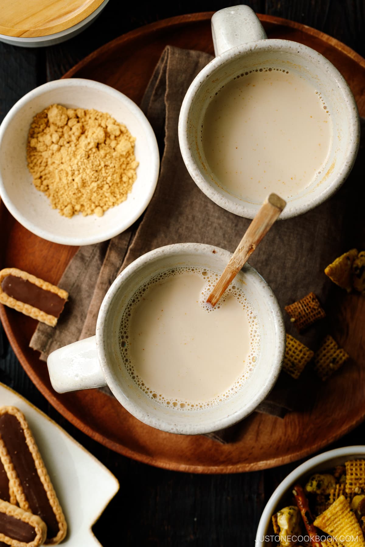 Handmade ceramic mug cups containing hot kinako milk.