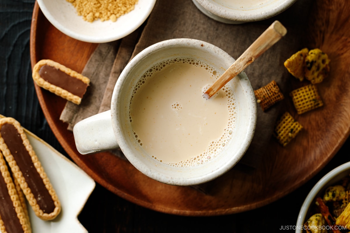 Handmade ceramic mug cups containing hot kinako milk.