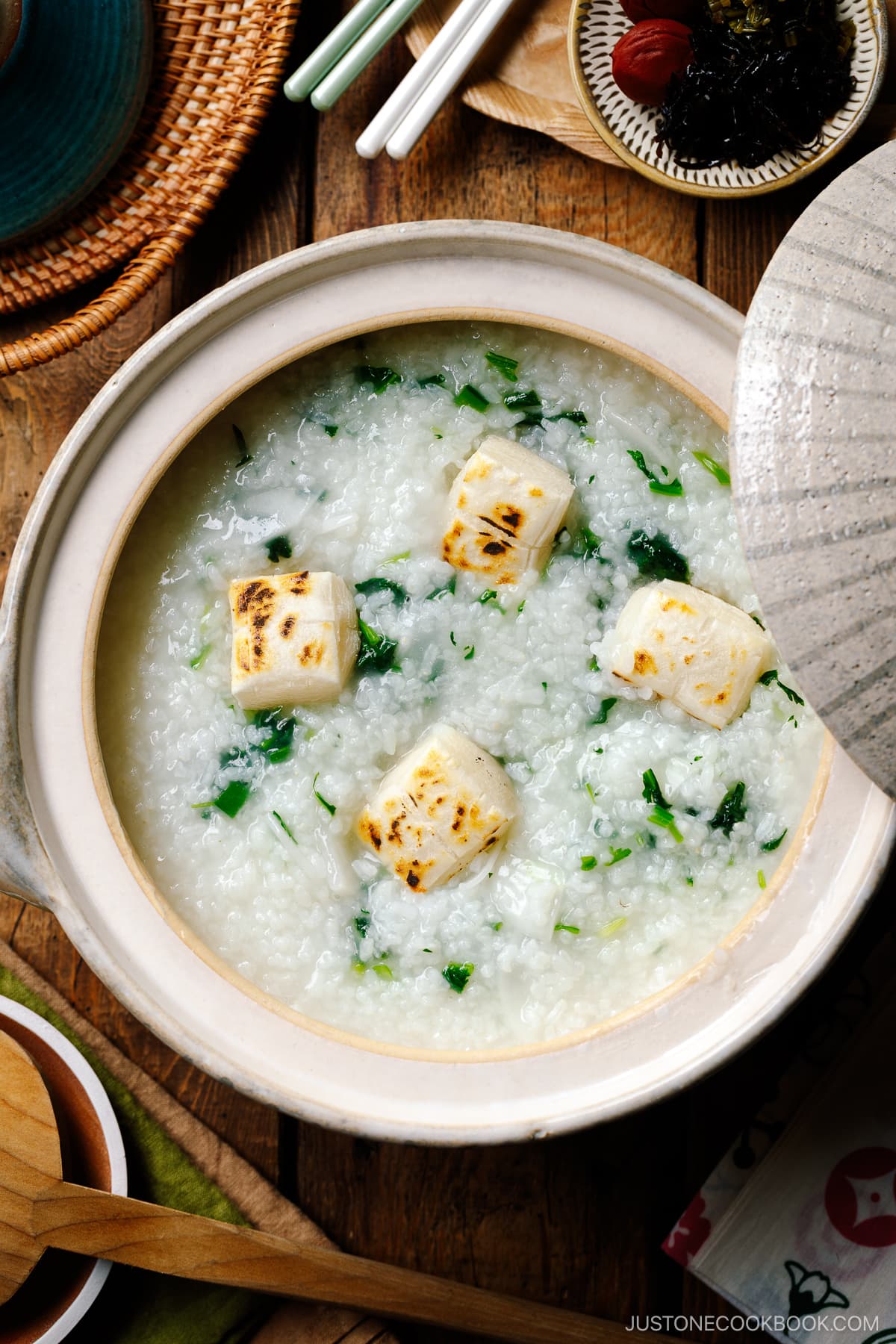 A donabe containing Nanakusa Gayu, Japanese seven herb rice porridge.