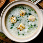 A donabe containing Nanakusa Gayu, Japanese seven herb rice porridge.