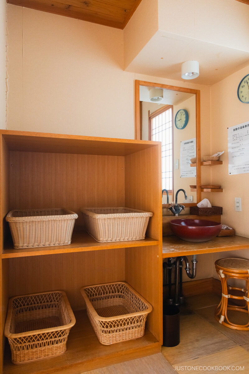 Private onsen room with sink and mirror