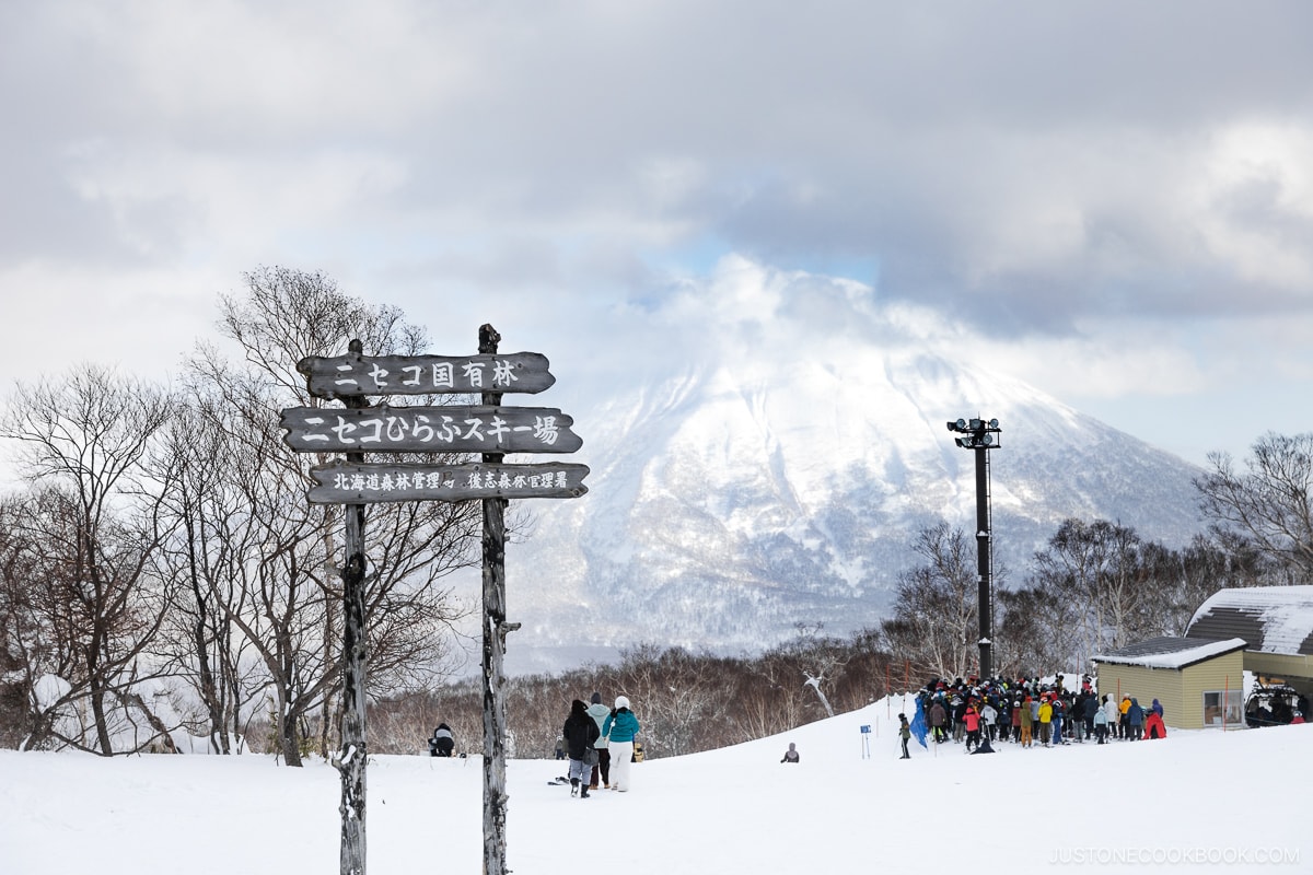 Niseko Hirafu Ski Resort sign with Mt Yotei in the background