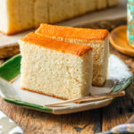 An octagon plate containing two slices of Castella cake.