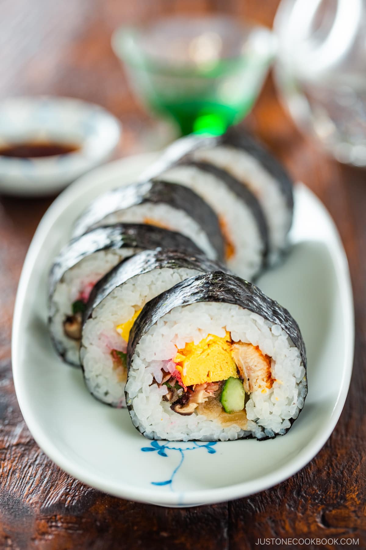 An oval plate containing Futomaki (Thick Maki Sushi).