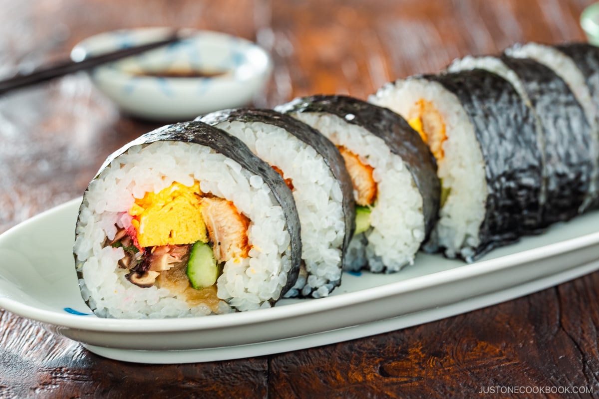 An oval plate containing Futomaki (Thick Maki Sushi).