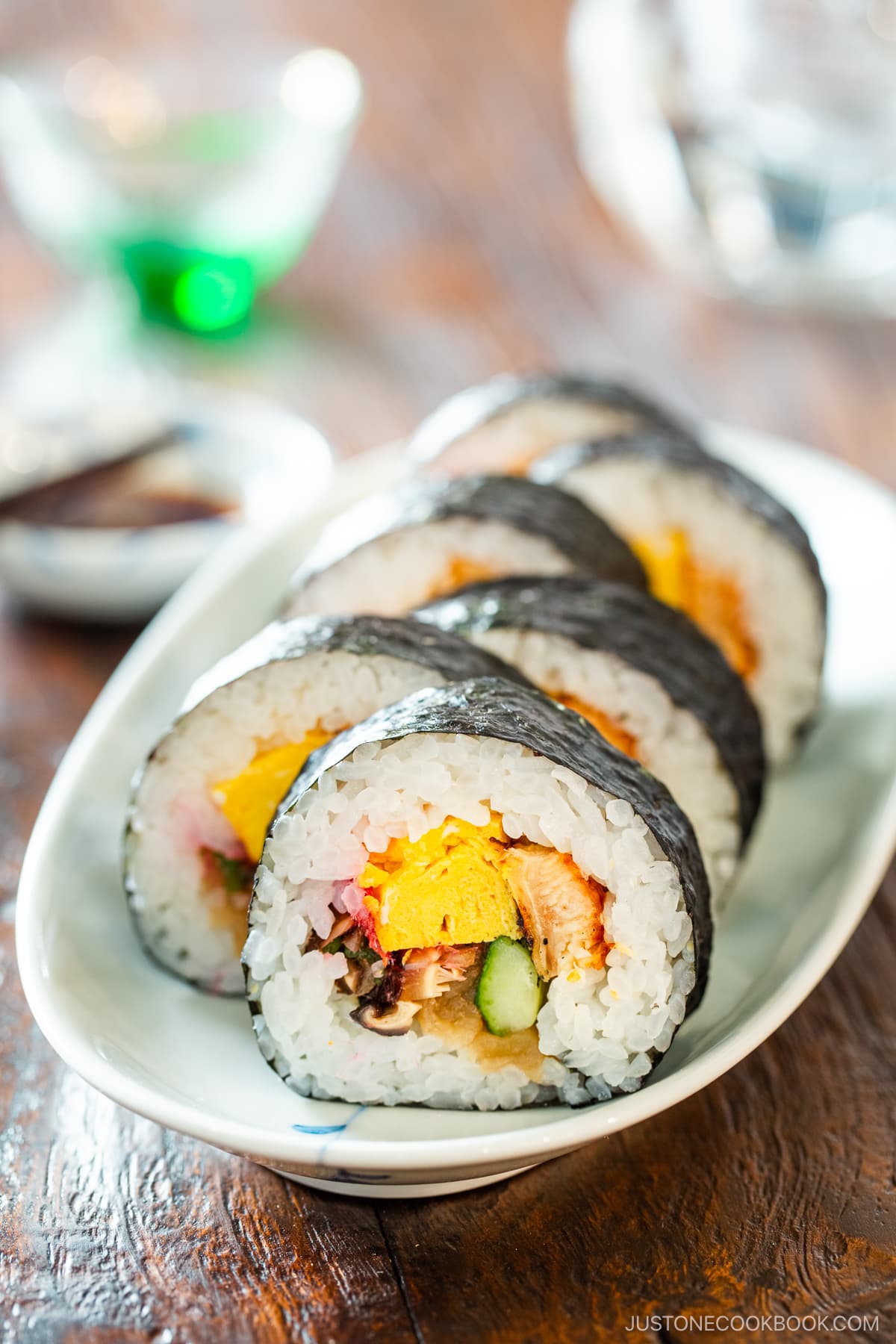 An oval plate containing Futomaki (Thick Maki Sushi).