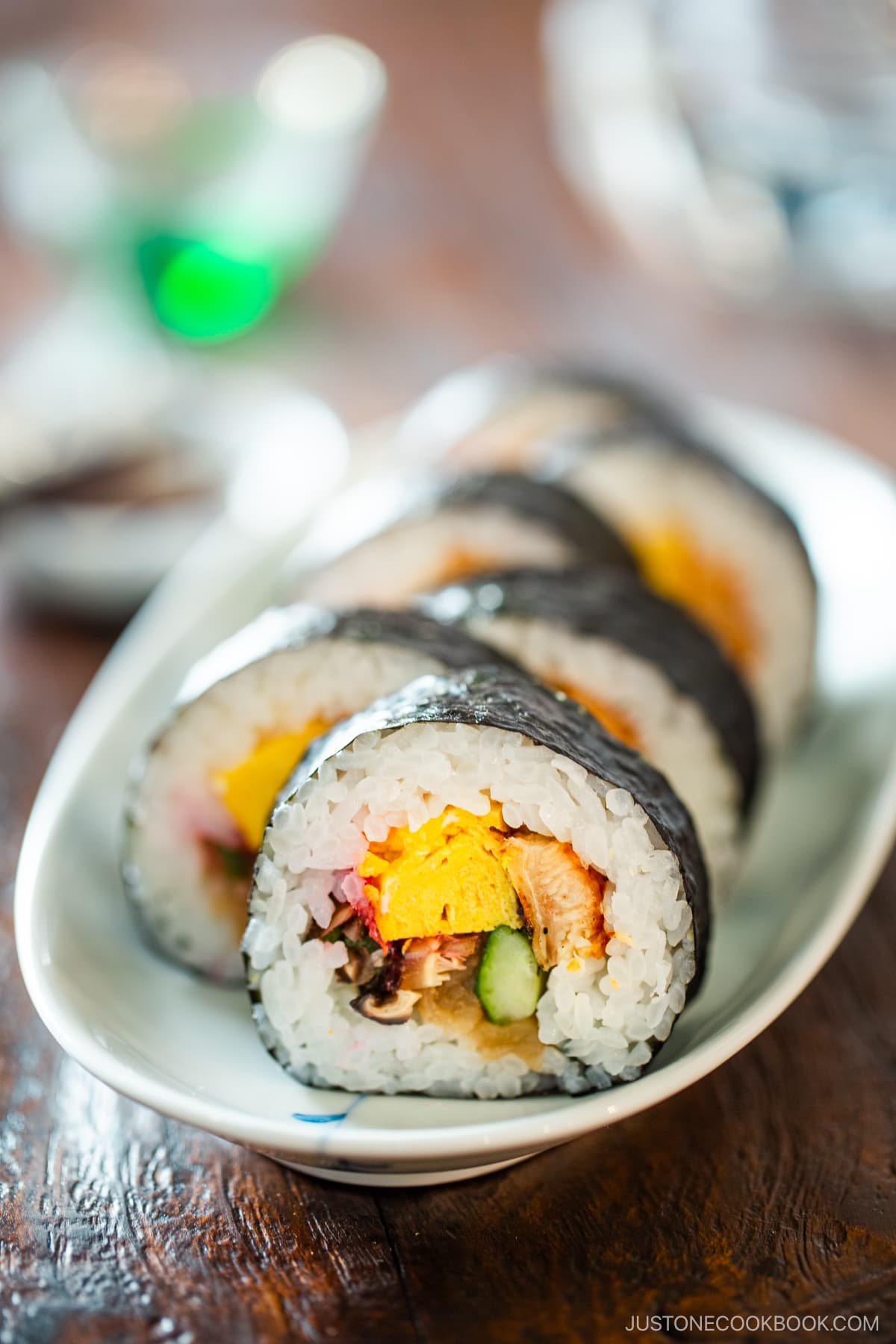 An oval plate containing Futomaki (Thick Maki Sushi).