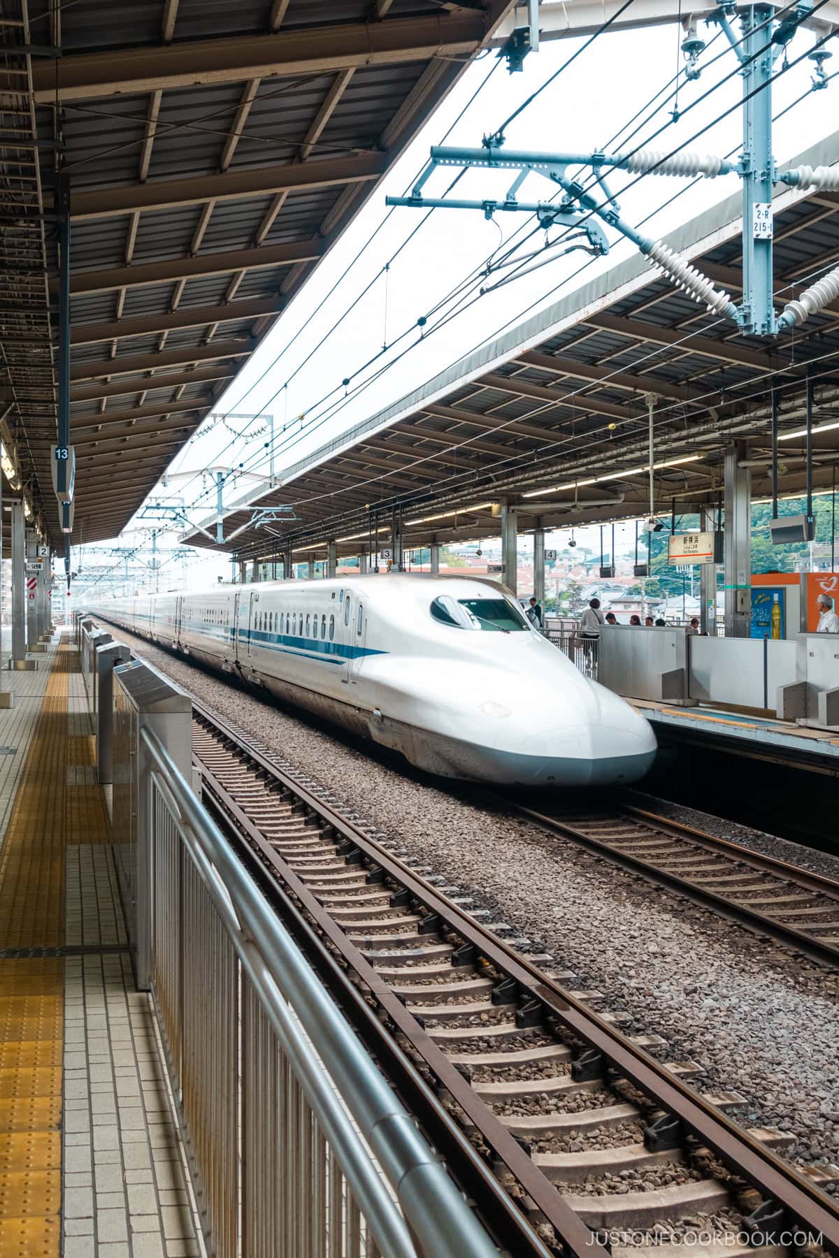 a blue and white shinkansen