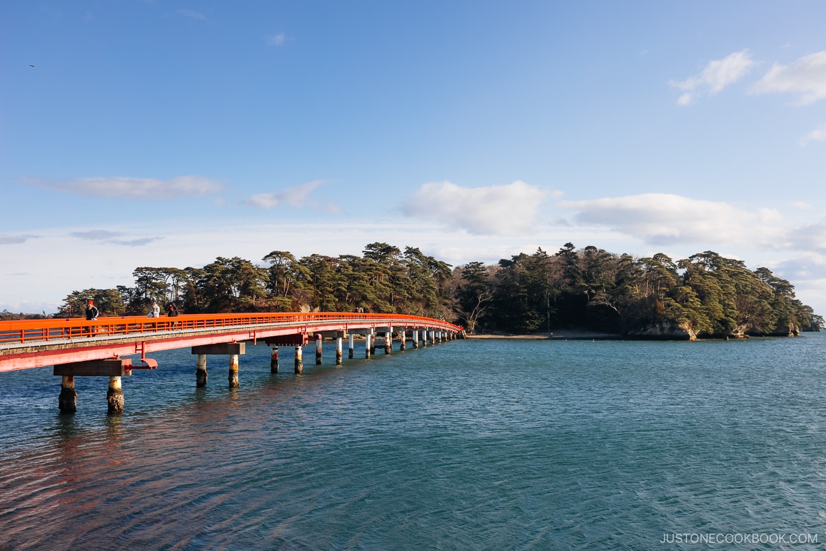 Red bridge leading to a small island