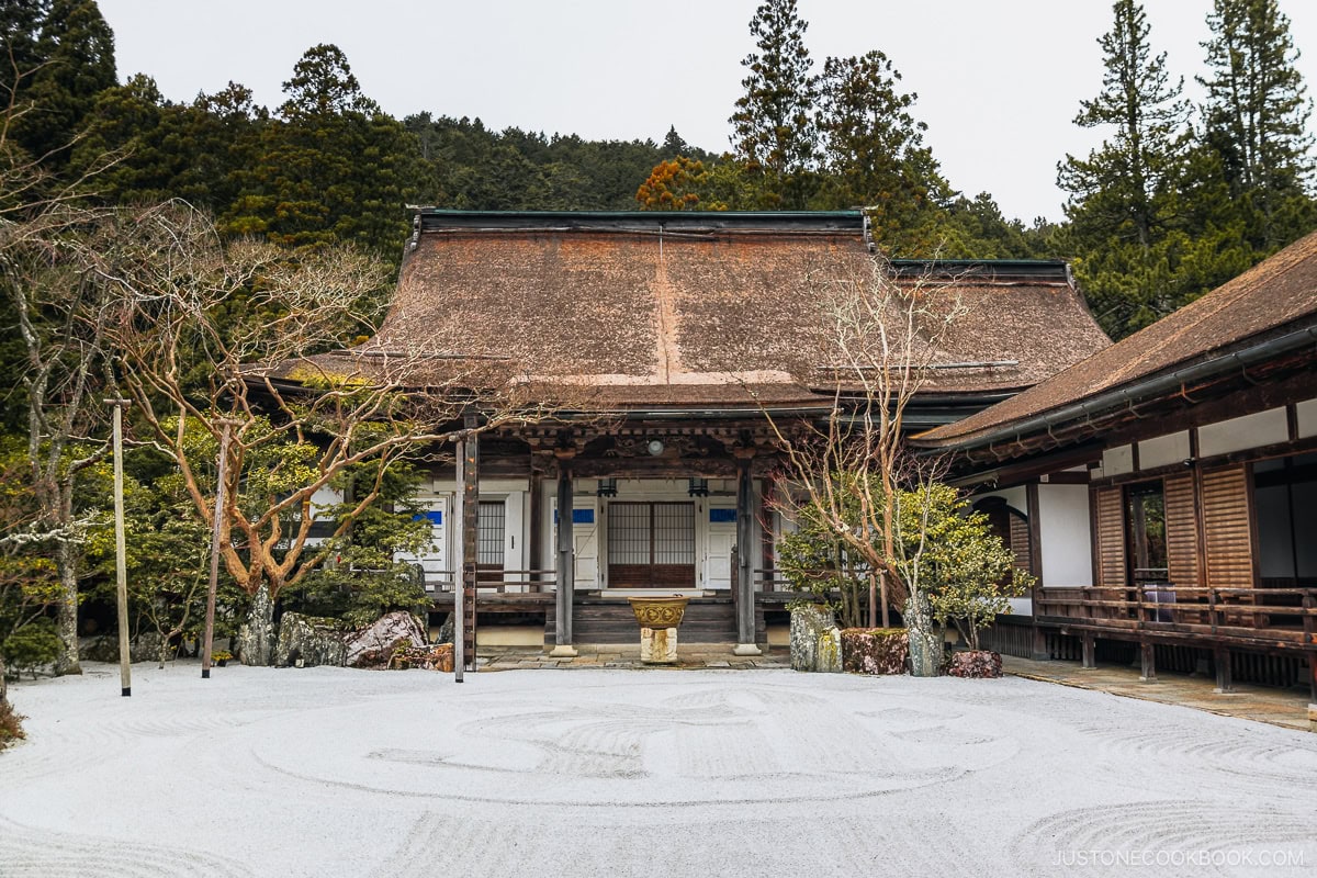 Temple zen garden with main hall in the background