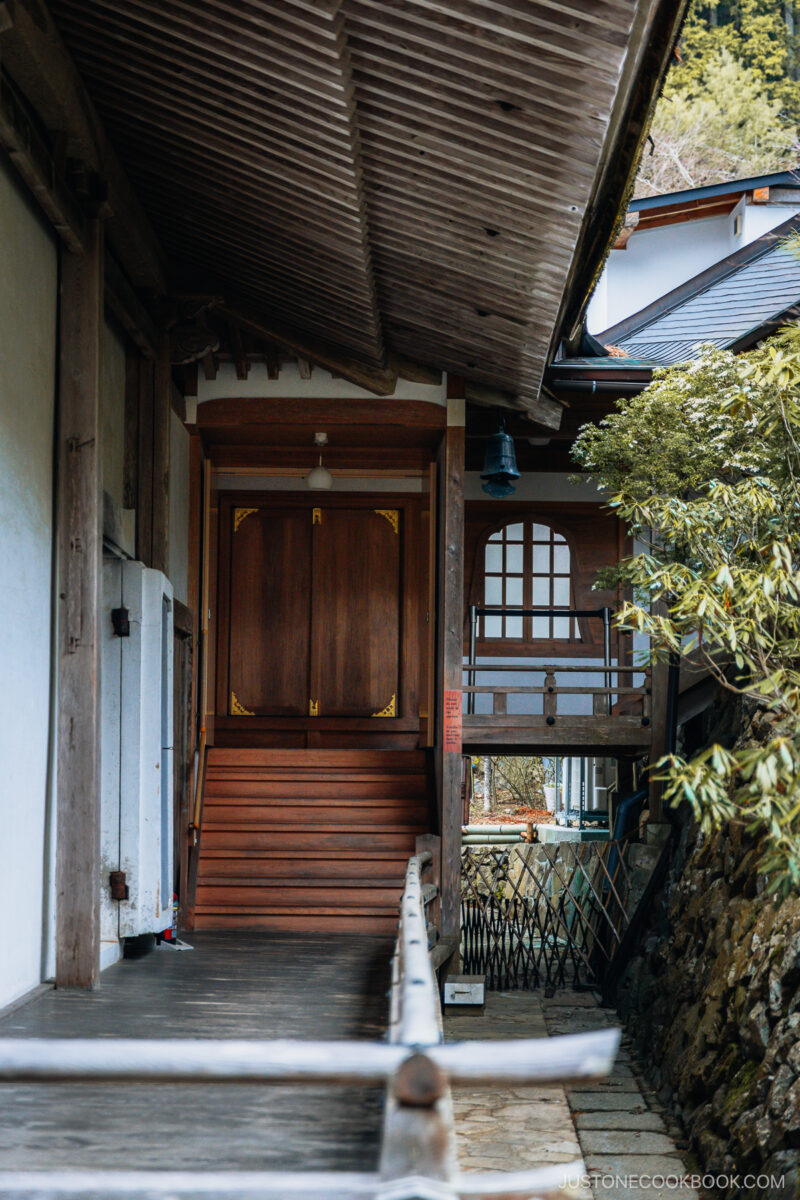 Temple wooden hallway next to outside garden