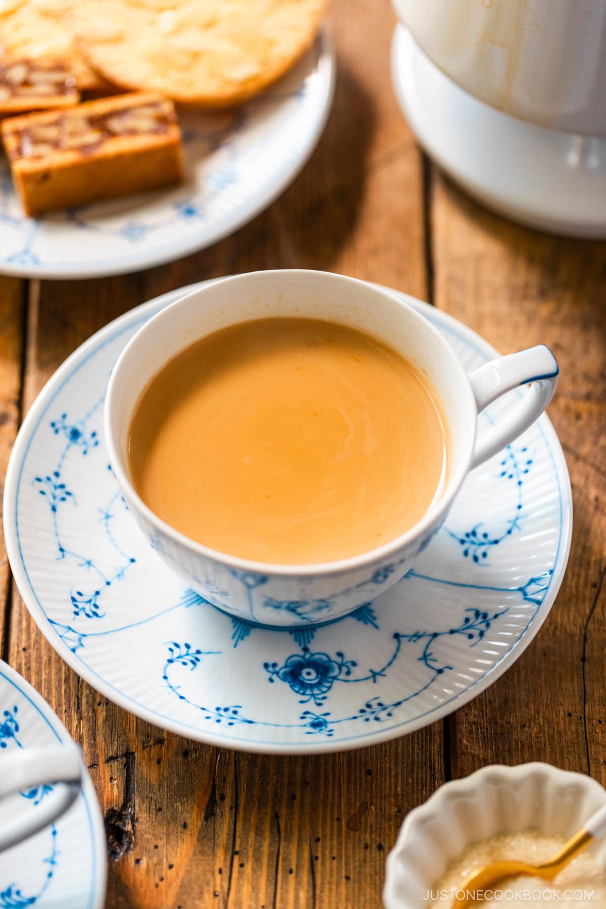 Royal Copenhagen cups containing Japanese Royal Milk Tea.