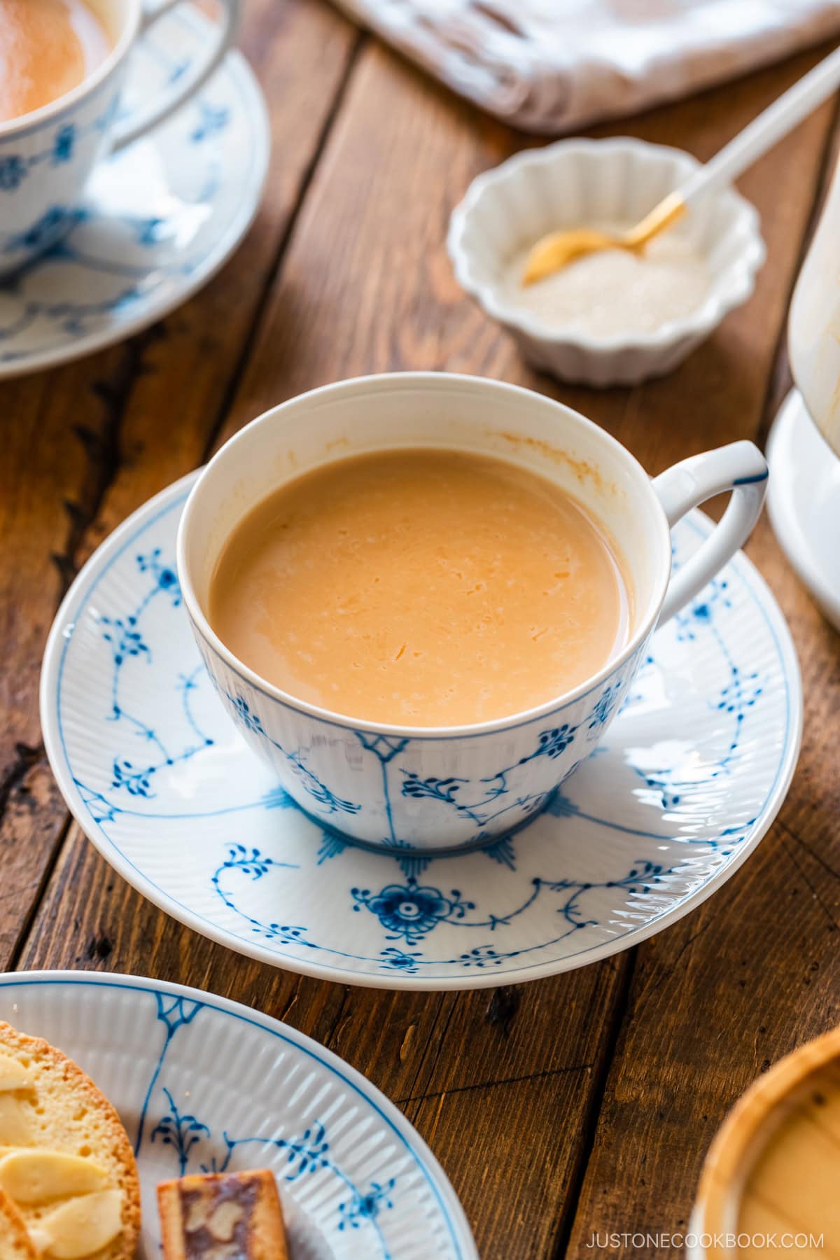 Royal Copenhagen cups containing Japanese Royal Milk Tea.