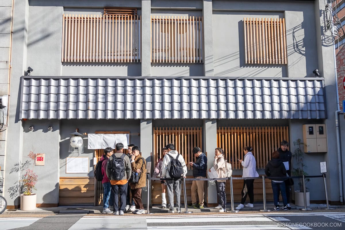 People lining up outside ramen shop