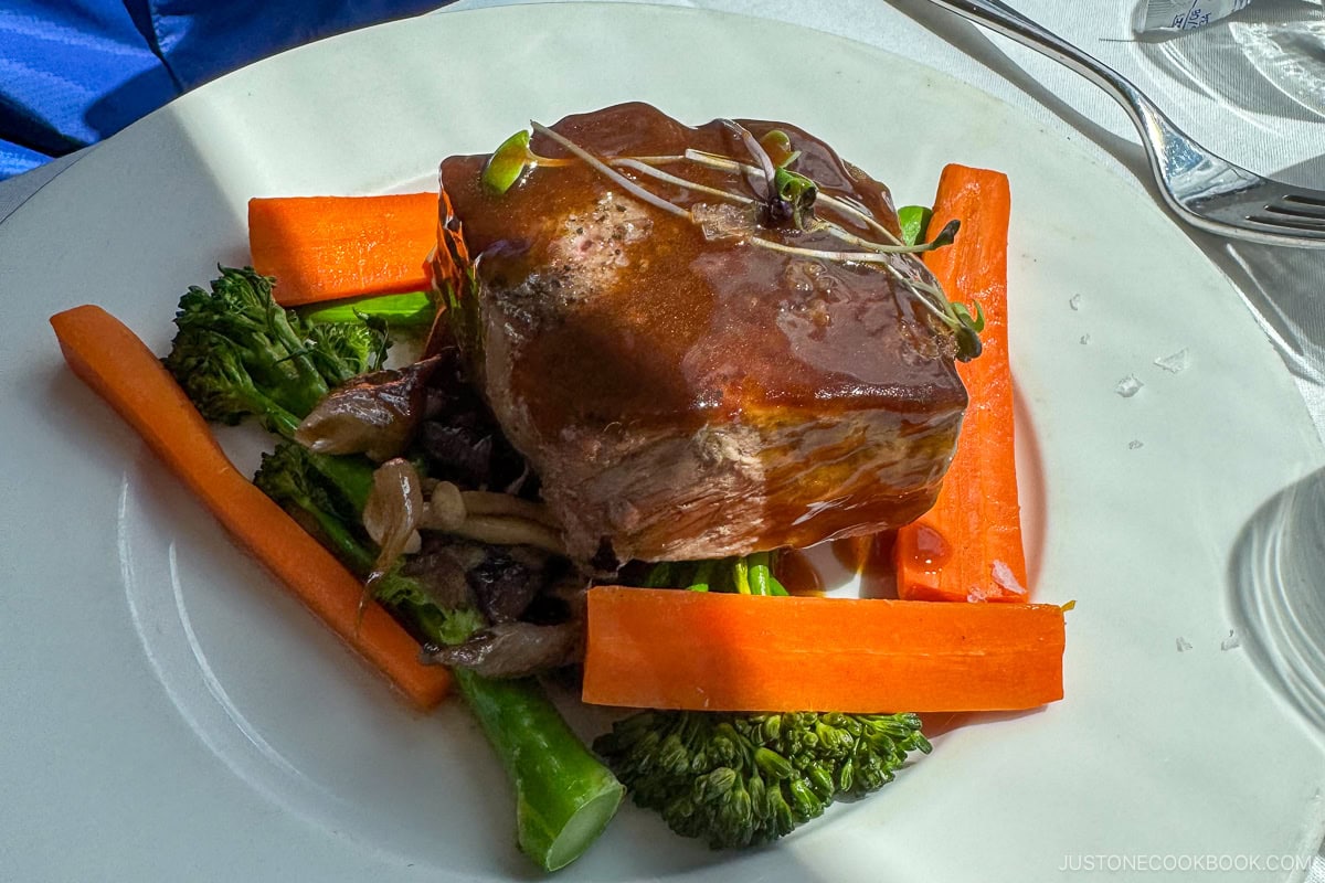 a steak on a white plate