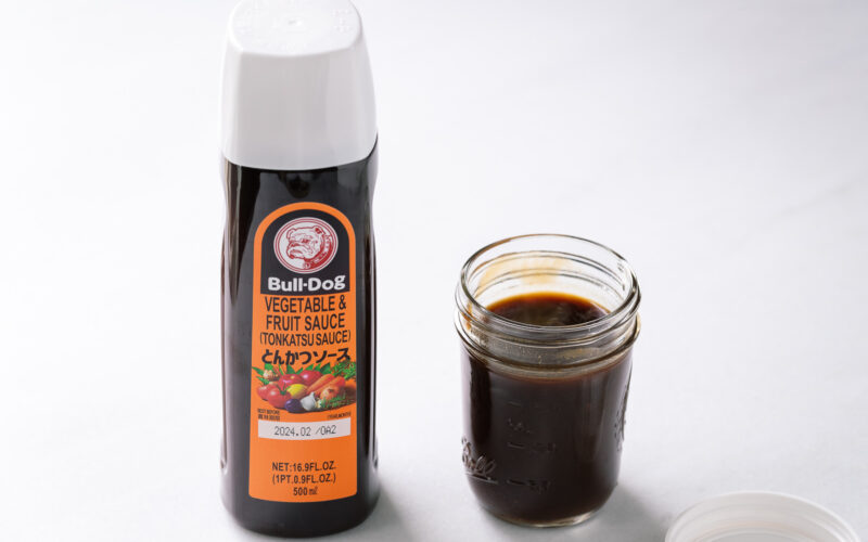 A bottle of Bulldog vegetable & fruit sauce (Tonkatsu sauce) and a mason glass jar of homemade tonkatsu sauce.
