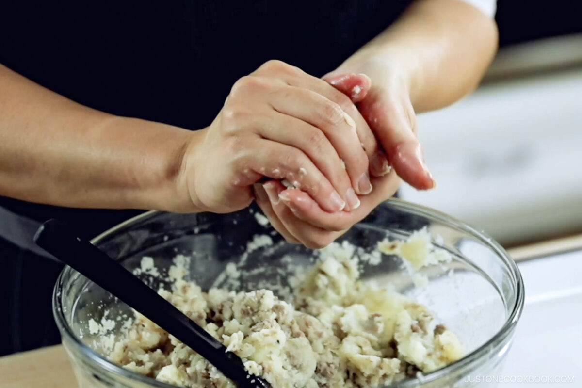 Forming the mixture into an oval shape.