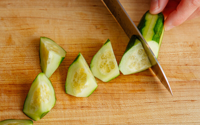 Cutting cucumber in rangiri Japanese cutting technique.
