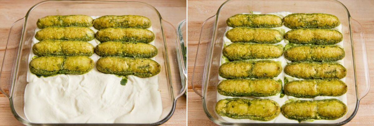 A glass baking dish with a layer of creamy white mixture topped with green pesto-coated ladyfinger cookies, resembling matcha tiramisu, shown in two stages: one with seven cookies and the other with eleven cookies arranged in rows.