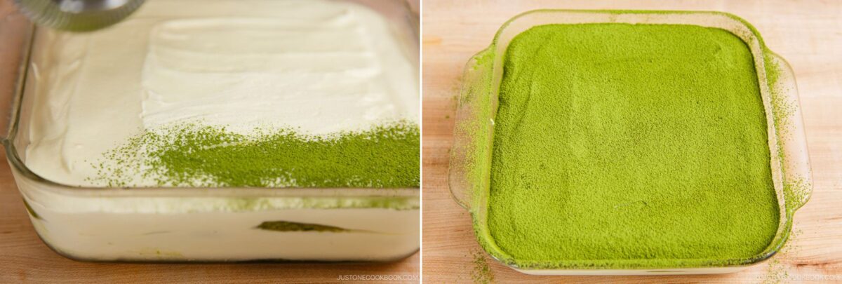 A glass baking dish with a creamy matcha tiramisu dessert being dusted with bright green matcha powder on the left, and fully covered with matcha powder on the right, sitting on a wooden surface.