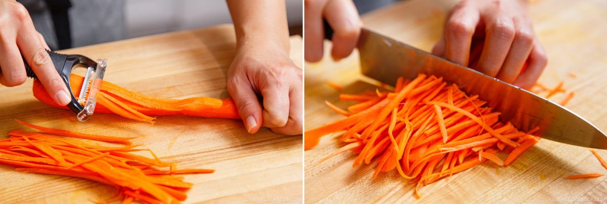 A person peels a carrot on a wooden board, then slices the peeled carrot into thin strips with a large knife—preparing fresh ingredients for an Asian Coleslaw with Sesame Dressing.