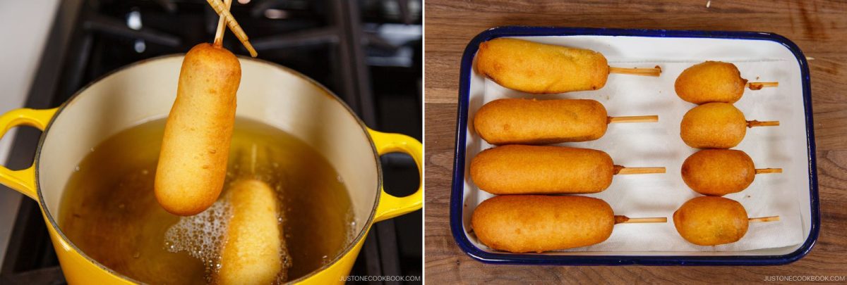 Left: A hand holding a freshly fried corn dog above a pot of hot oil. Right: Several golden corn dogs on a white tray lined with paper towels on a wooden surface.