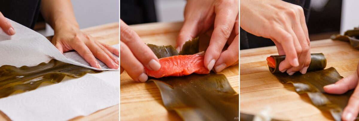 Three-panel image: hands patting kelp dry with a paper towel, placing a slice of raw salmon on the kelp, and tightly rolling the Kobumaki (Salmon Kombu Roll) on a wooden surface.