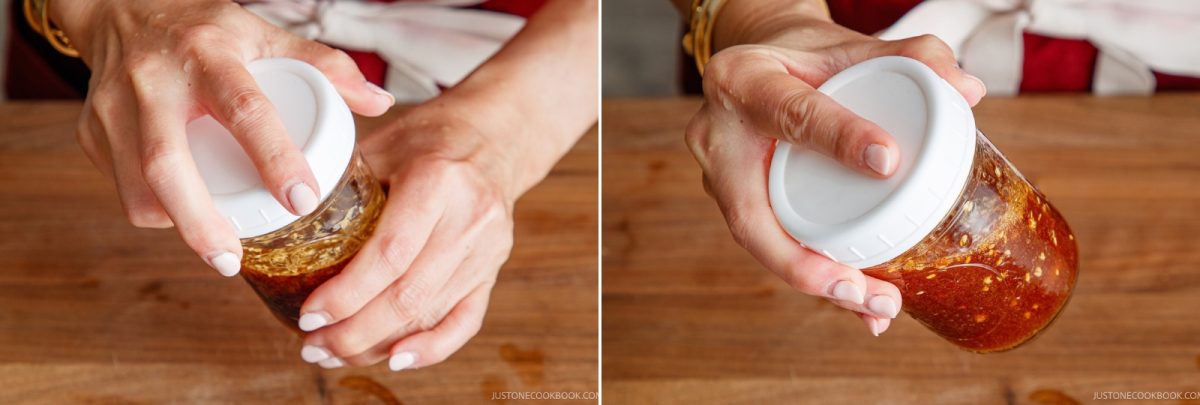 Two images show hands holding and shaking a glass jar with a white lid, filled with a reddish-brown wafu dressing, over a wooden surface.