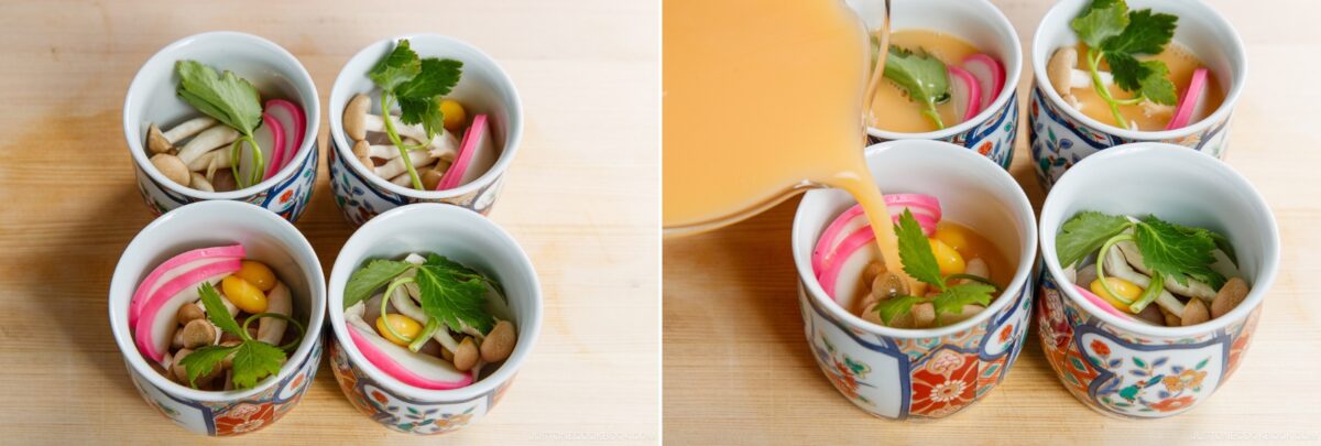 Four decorative bowls filled with assorted vegetables and herbs. On the right, a light orange broth is being poured into one bowl, preparing a colorful and appetizing Chawanmushi (Japanese Savory Steamed Egg Custard) dish.