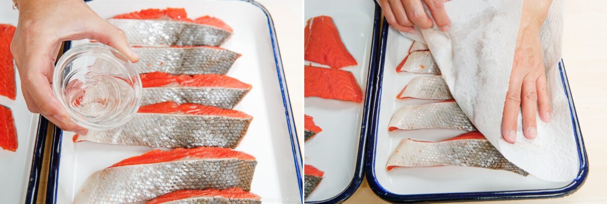 Salted salmon fillets on a baking sheet, being prepared for traditional Japanese shiozake.