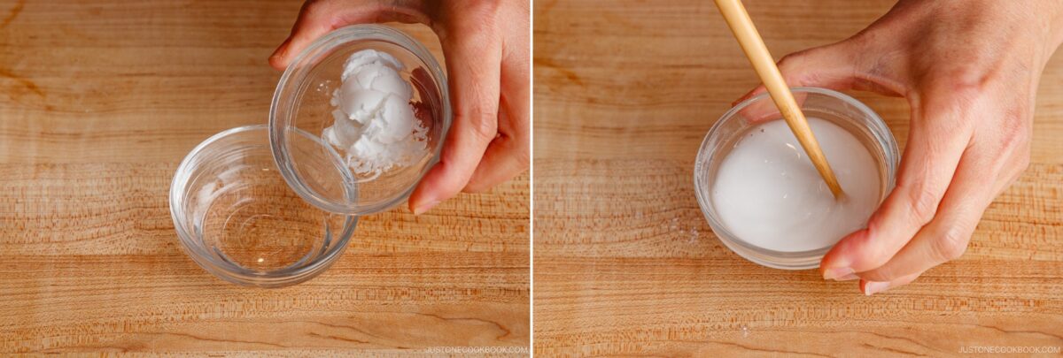 Two photos: on the left, a hand adds a spoonful of white cornstarch to a clear bowl; on the right, a hand stirs a cloudy white mixture—an essential step when preparing Simmered Potato and Chicken—using a wooden stick in the same bowl.
